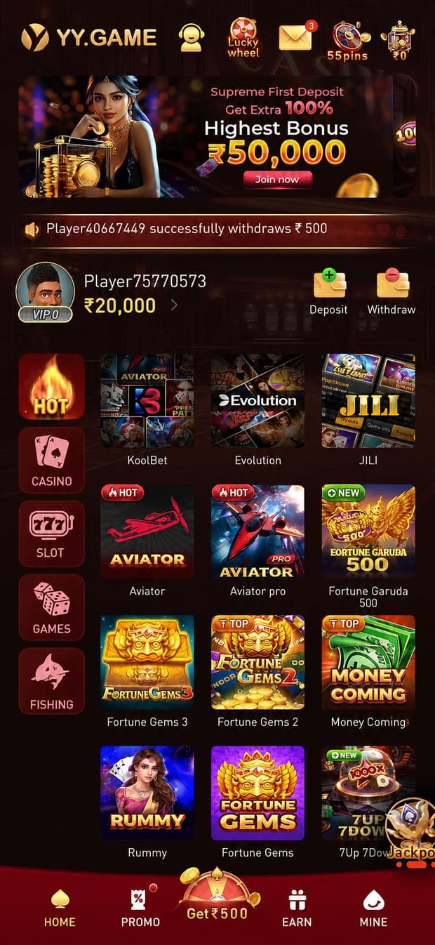 YY Game app lobby showing hot games, casino, slots and fishing categories with a ₹50,000 first-deposit banner